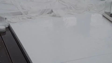 A wet floor outside is mopped to remove water 库存影片 329094476