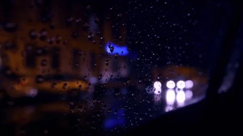 Wet glass machine night interior. Night road in rain Video stock 82739816