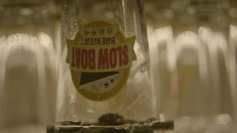 Wet Glassware Draining Upside Down in Bar Interior, Beijing, China Stock Footage 345761305