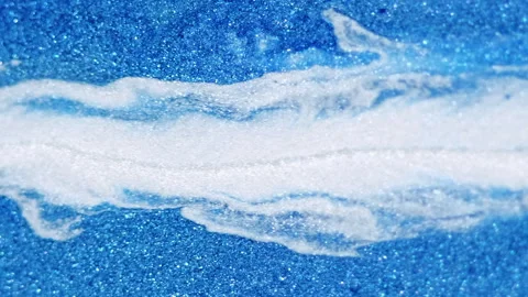 Wet glitter drip ink spill blue white paint drop Stock Footage 280020941