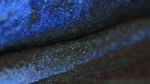 Wet glitter texture sparkling fluid red blue paint Stock Footage 279436569