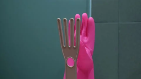 Wet gloves on the gloves drying rack. 動画素材 143009813