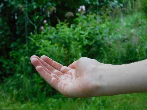 Wet hand Stock Photos