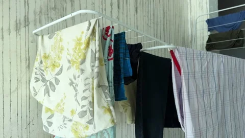 Wet Laundry Hanging On Indoor Drying Rack Stock Footage 340856867