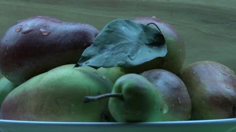 Wet pears on the plate Stock Footage 80108312