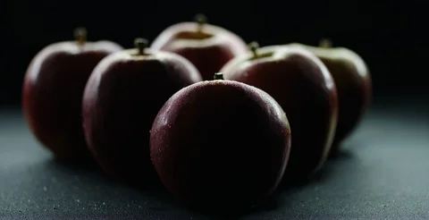 Wet red apples. Moving light and shadows, 6K shot on Red Stock Footage 127685611