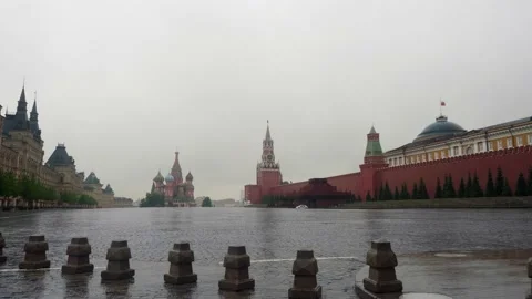 Wet Red square pavement without tourists in rainy afternoon. Empty touristic Stock Footage 133248894