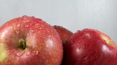 Wet ripe apples rotating Stock Footage 140191911