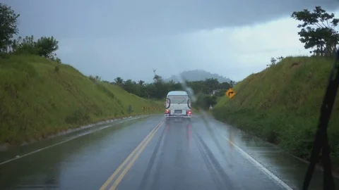 Wet road from the car window while driving in rainy weather Stock Footage 73114342