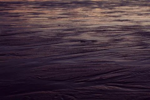 Wet Sand in Dusk Light 스톡 사진
