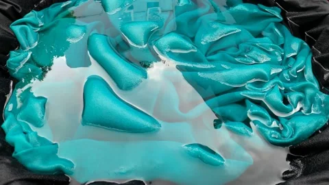Wet Solid Medical Green Cyan Fabric Background Pile Shaking Wave On Fresh Water Video stock 150299196