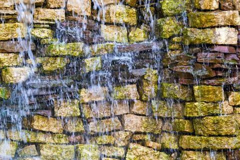 Wet stone brick wall Stock Photos