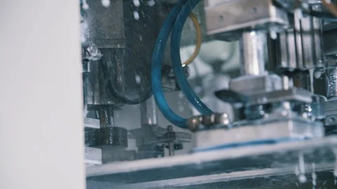 Wet stone grinding machine tuning skis in repair shop Stock Footage 94194467