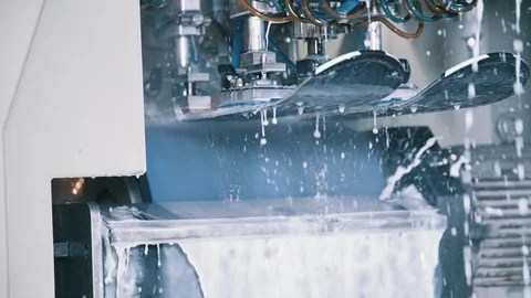 Wet stone grinding machine tuning skis in repair shop Stock Footage 94194607