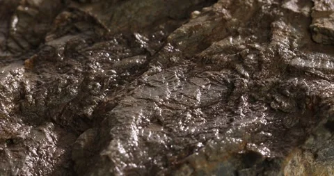 Wet stone texture close-up. macro shot of a rock. natural mineral background Video stock 245233167