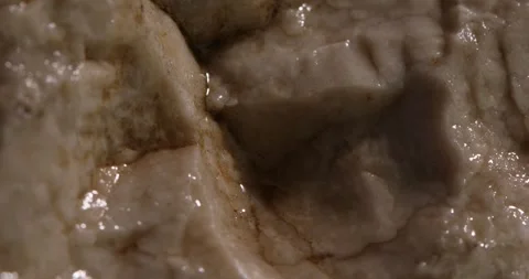 Wet stone texture close-up. macro shot of a rock. natural mineral background Stock Footage 246293855