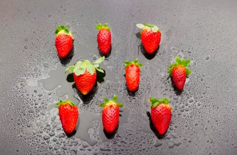 Wet strawberries Stock Photos