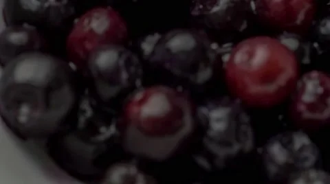 Wet thawed blueberries added to pancake batter then folded into cake mixture  Stock Footage 61846465