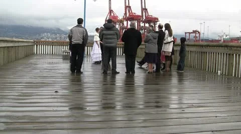 Wet Wharf Wedding And Passing Of The Bouquets Stock Footage