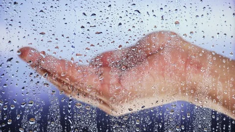 Wet window after rain stretches helping hand. problem homeless and beggars Video stock 122084126