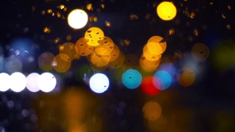 Wet the window with the background of the night city traffic view Stock-Footage 70190581