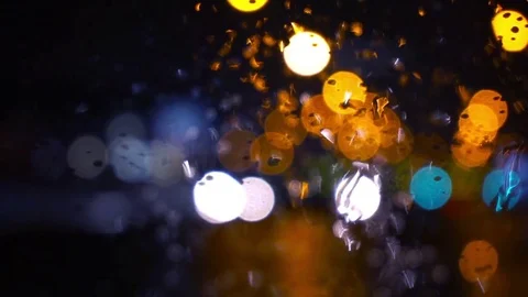 Wet the window with the background of the night city traffic view Stock-Footage 70223099