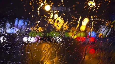 Wet the window with the background of the night city traffic view Stock-Footage 70270098