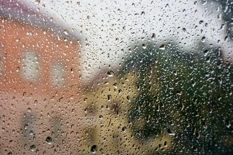 Wet window background. rain drop on the glass surface Stock Photos