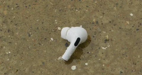 Wet wireless earphone in the Rain. Stock Footage 236074916