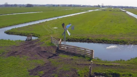 Wetland Draiage Windmill Stock Footage 156504649