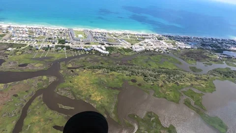 Wetlands Behind Oceanfront Development on Atlantic Ocean Island Stock Footage 137906460