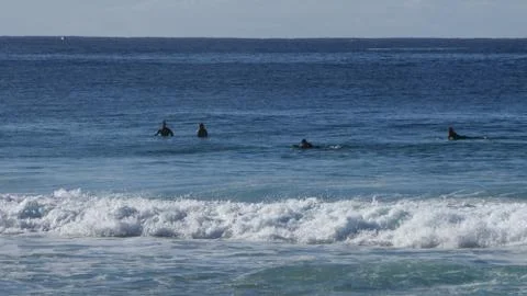 Wetsuit surfers5 Stock Photos