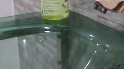 Wetting hands with water at the sink Video stock 136934166