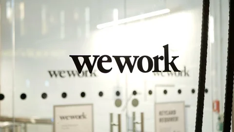 Wework logo on the main entrance of Wework office in Prague Video stock 120260425