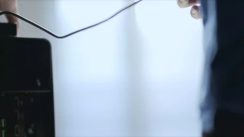 WFH Day 29_plugging cable into the external gpu. Stock Footage 129725305