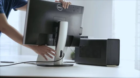 WFH Day 49-an asian young man prepares to work with the monitor, laptop Stock Footage 129727364