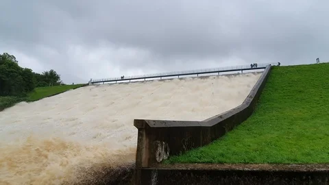 Whaley Bridge Todd Brook Reservoir Emergency spillway in operation close up Stock Footage 123544162