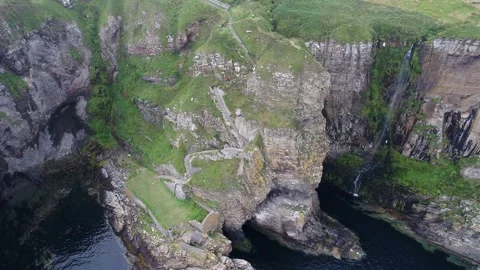 Whaligoe steps in Lybster Sutherland drone aerial video Stock Footage 247350860