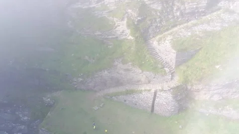 Whaligoe steps in Lybster Sutherland drone aerial video Stock Footage 247350863