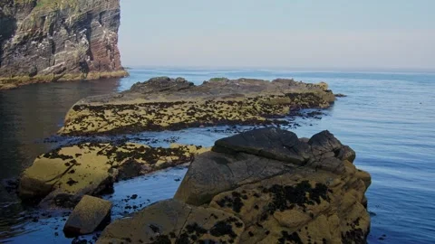 Whaligoe steps in Lybster Sutherland drone aerial video Stock Footage 247350931
