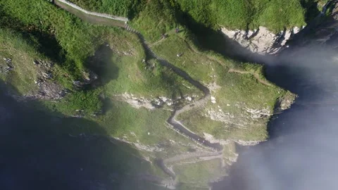 Whaligoe steps in Lybster Sutherland drone aerial video Stock Footage 247350939