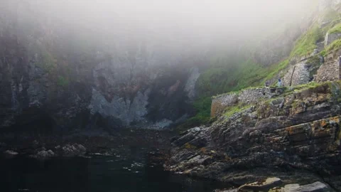 Whaligoe steps in Lybster Sutherland drone aerial video Stock Footage 247352813