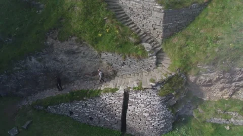 Whaligoe steps in Lybster Sutherland drone aerial video Stock Footage 247352909