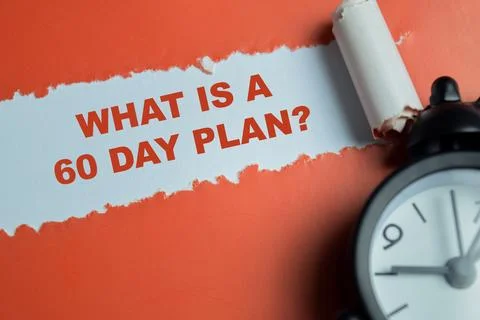 What is a 60 day plan text written in torn paper. Stock Photos