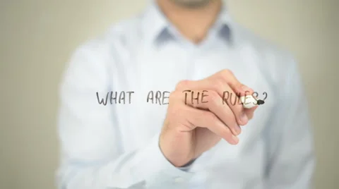 What  Are The Rules ? , man writing on transparent screen Stock Footage 62886906