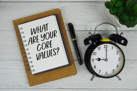What Are Your Core Values? text written on notepad with alarm clock on wood.. 스톡 사진