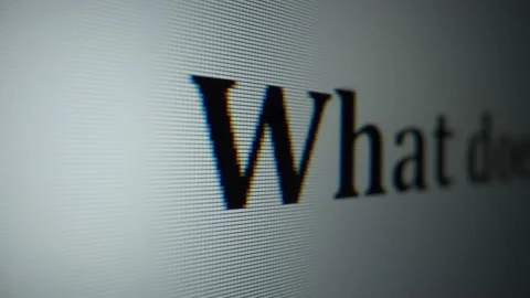 What does... mean. Close-up text on monitor Vídeo Stock 231654591