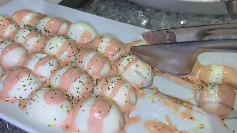 What a festive table without stuffed eggs, add piquancy in the form of red Stock Footage 245784883