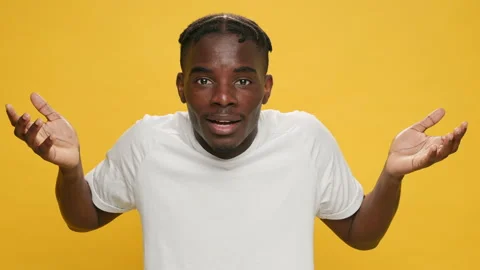 What the hell? Surprised black young African American man raising his hands Stock Footage 154004783