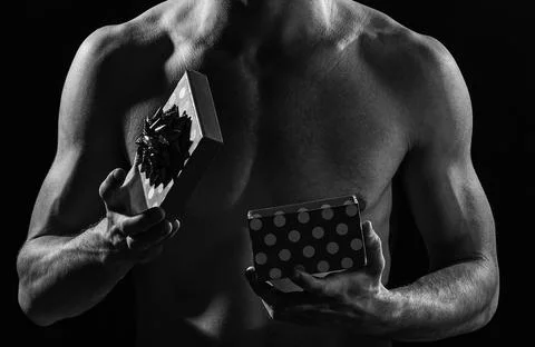 What is inside. love gift for date. passion and desire. man ready to erotic Stock Photos